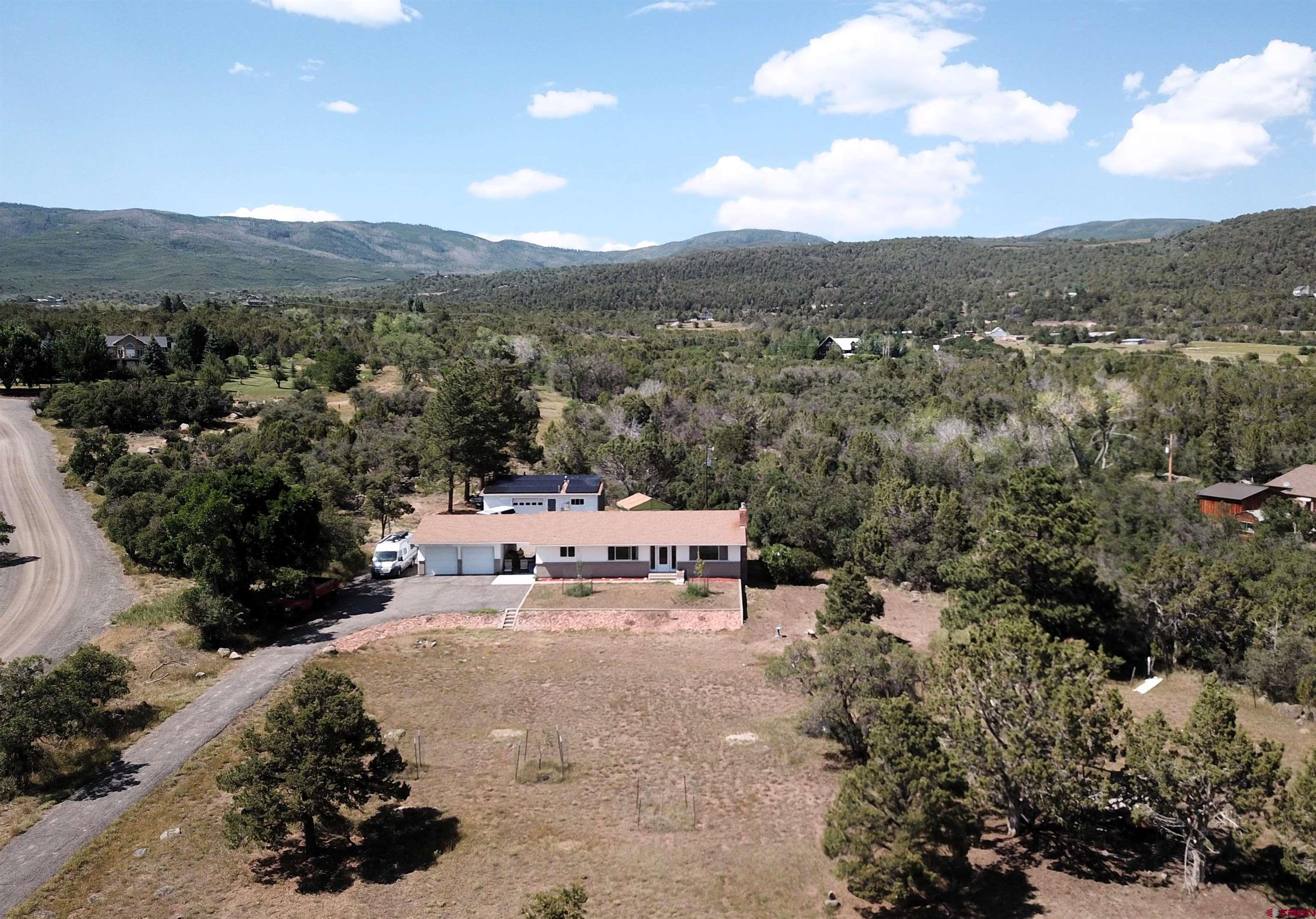 22755 Uintah Road Cedaredge, CO 81413 - Photo 3 of 21 a view of a city