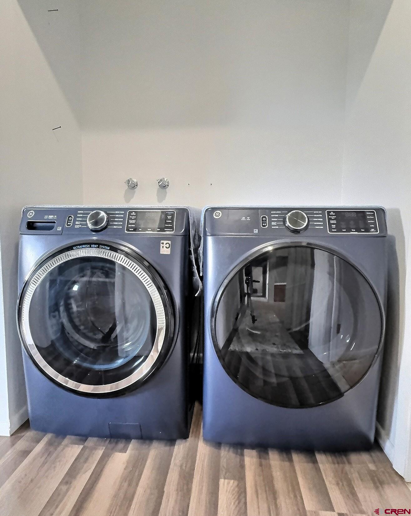 22755 Uintah Road Cedaredge, CO 81413 - Photo 10 of 21 a utility room with a sink washer and dryer