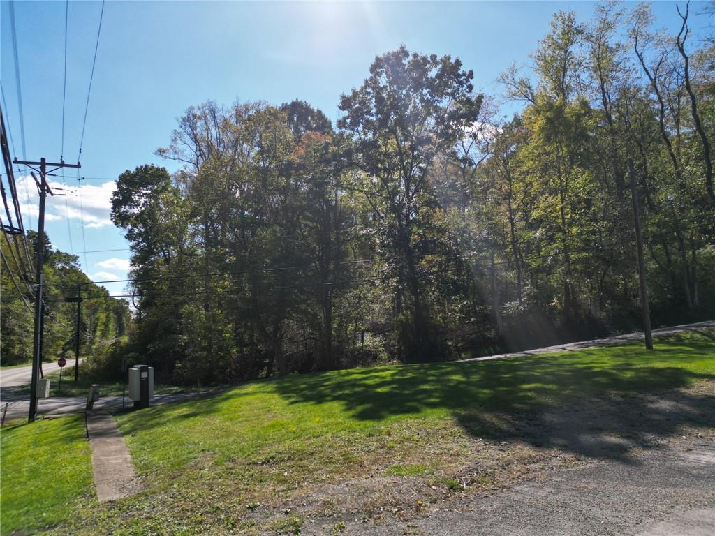3400 Conway Wallrose Road Sewickley, PA 15143 - Photo 11 of 14 a backyard of a house with lots of green space