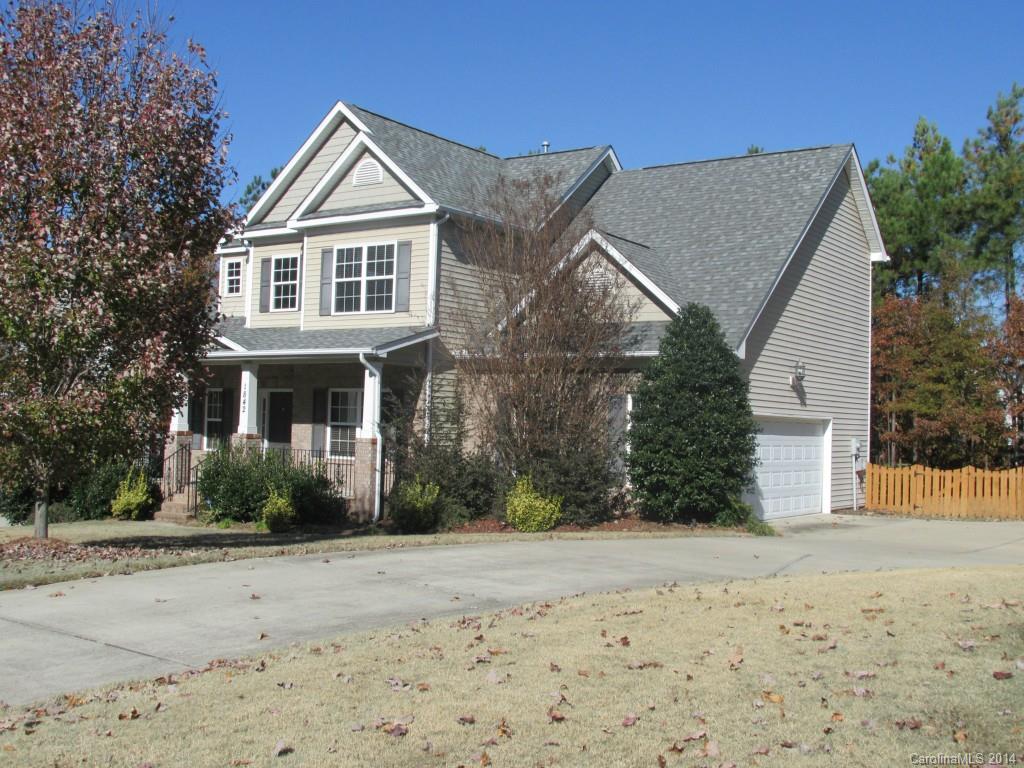 1842 Sam Smith Road, Unit 7 Fort Mill, SC 29708 - Photo 1 of 16 a front view of a house with a yard