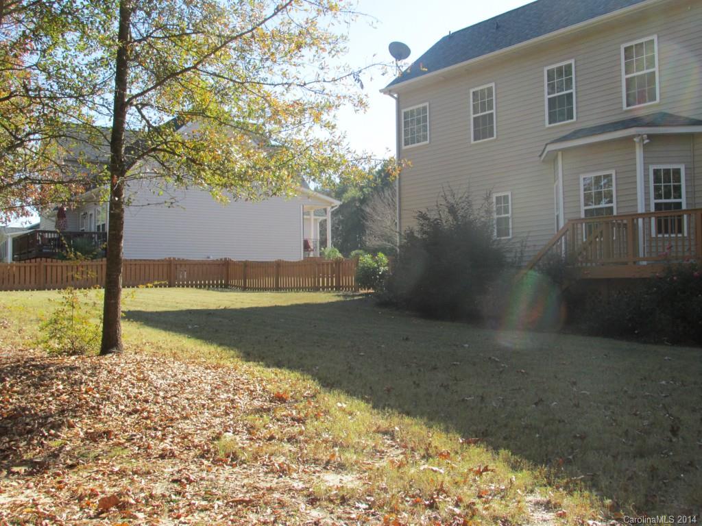 1842 Sam Smith Road, Unit 7 Fort Mill, SC 29708 - Photo 3 of 16 a view of a backyard of the house