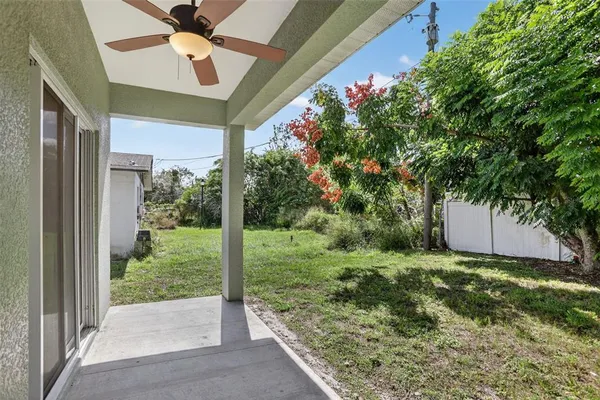 a view of a porch with a tree