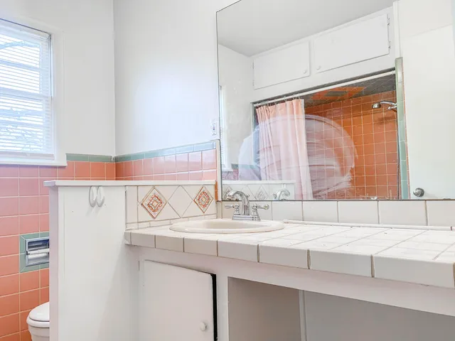 a bathroom with a sink and a bathtub