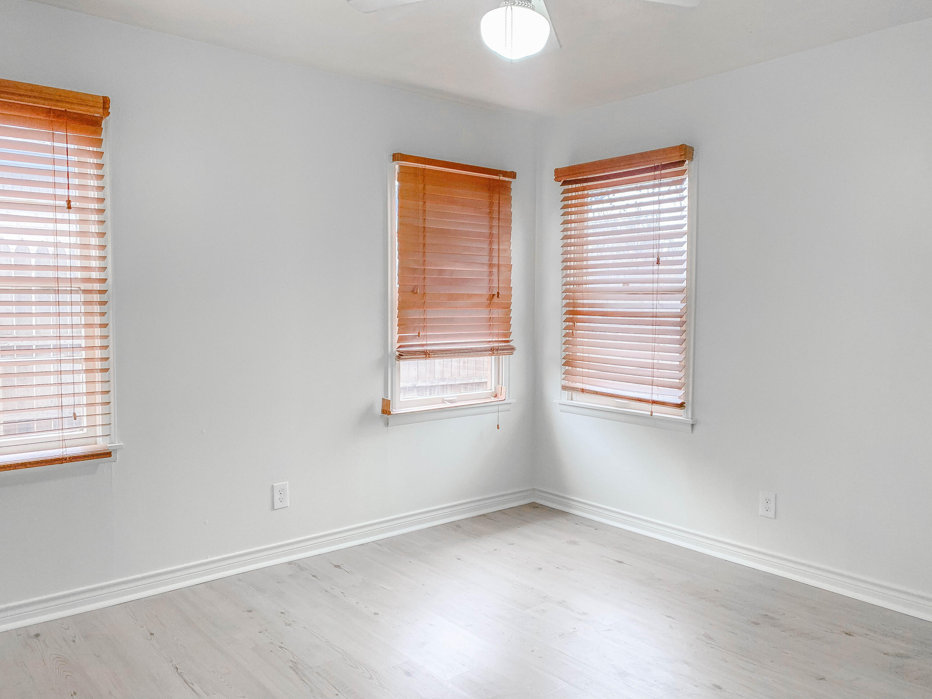 4315 42nd Street Lubbock, TX 79413 - Photo 7 of 11 an empty room with a window