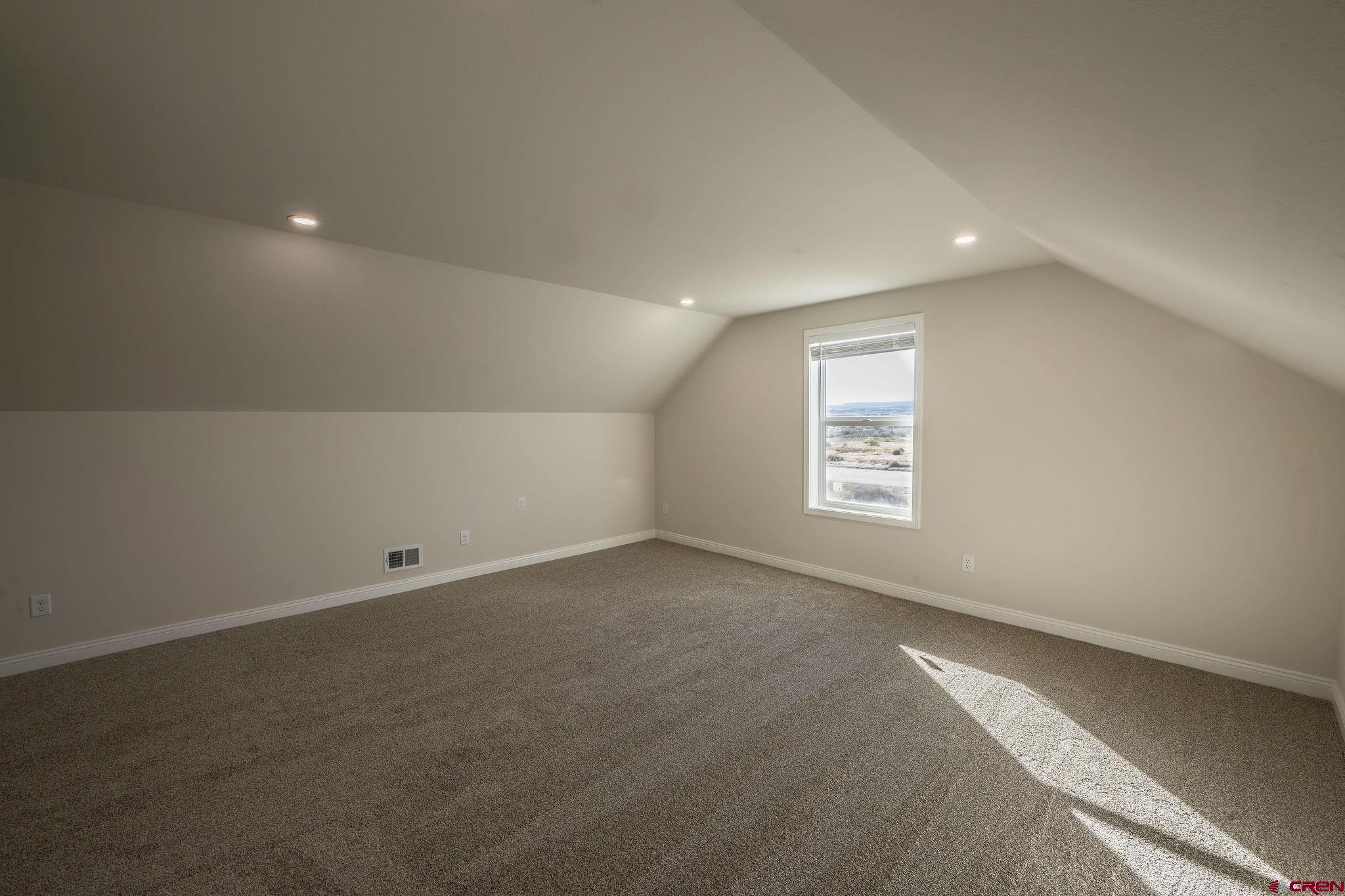1230 H25 Road Delta, CO 81416 - Photo 29 of 34 an empty room with a empty space and a window
