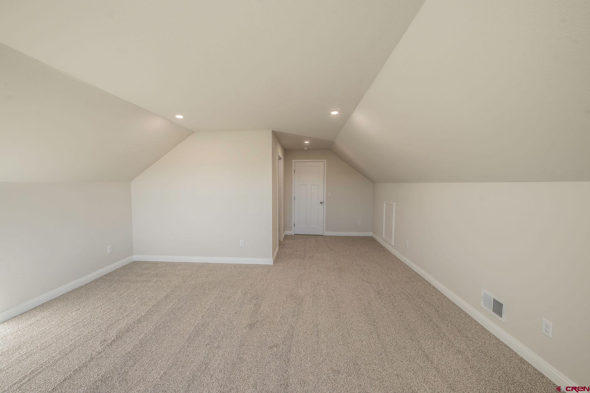 1230 H25 Road Delta, CO 81416 - Photo 30 of 34 an empty room with a empty space and windows