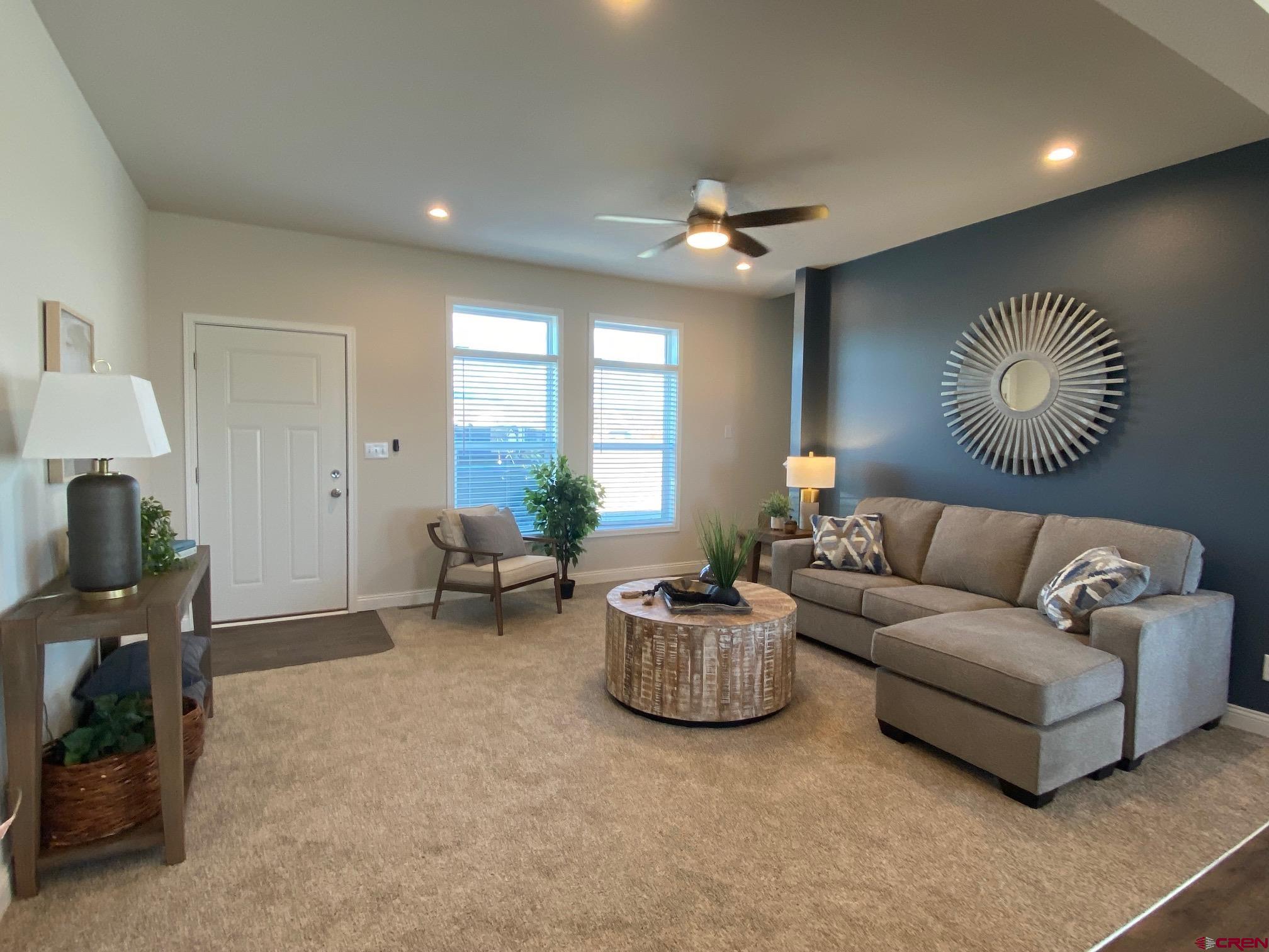 1230 H25 Road Delta, CO 81416 - Photo 3 of 34 a living room with furniture and a lamp