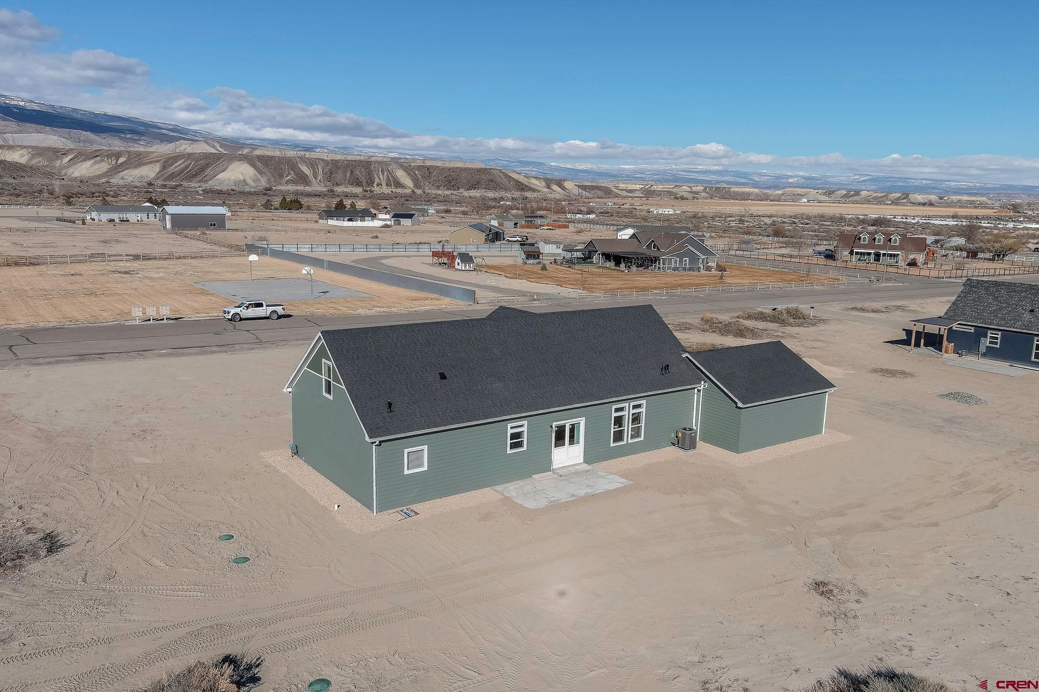 1230 H25 Road Delta, CO 81416 - Photo 33 of 34 an aerial view of residential houses with outdoor space