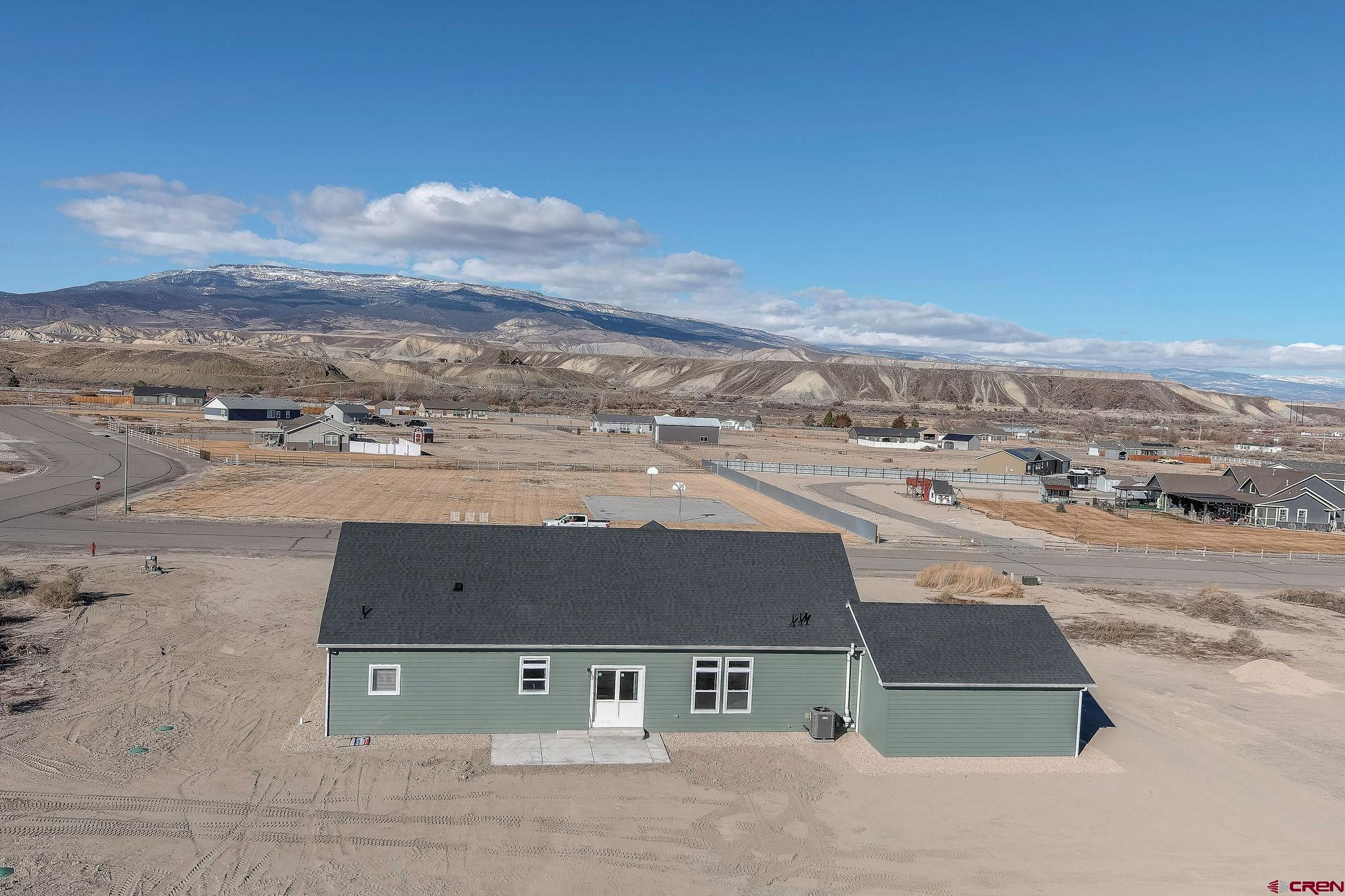 1230 H25 Road Delta, CO 81416 - Photo 34 of 34 an aerial view of residential houses with outdoor space