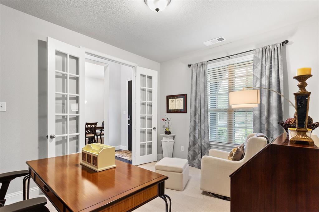 1003 Fenwick Lane Forney, TX 75126 - Photo 19 of 39 a living room with furniture and a window