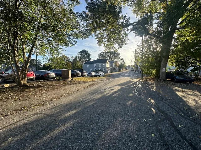 a view of road with trees