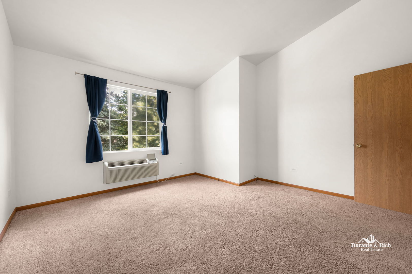 1419 McClure Road, Unit 1419 Aurora, IL 60505 - Photo 6 of 12 an empty room with windows