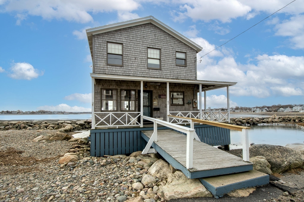 a view of a house with roof deck