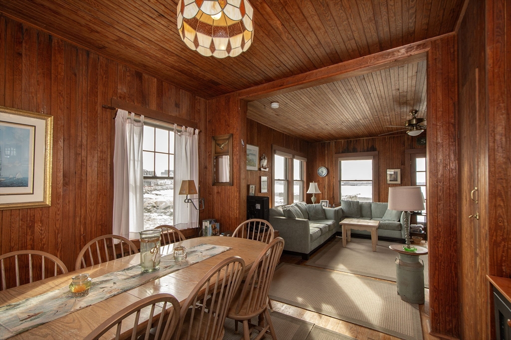 42 Lighthouse Road Scituate, MA 02066 - Photo 15 of 27 a view of a livingroom with furniture and windows