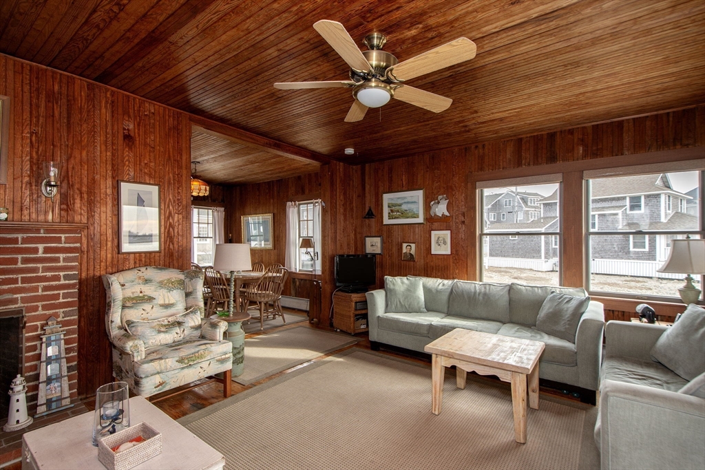 42 Lighthouse Road Scituate, MA 02066 - Photo 17 of 27 a living room with furniture or outdoor view and a large window