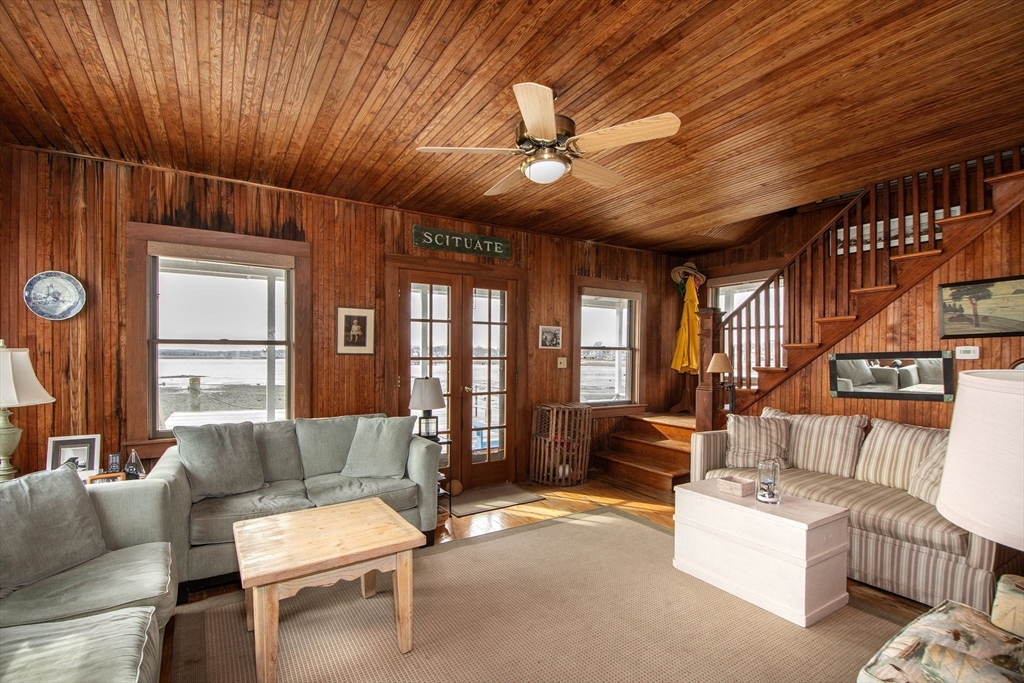 42 Lighthouse Road Scituate, MA 02066 - Photo 20 of 27 a living room with furniture and a large window