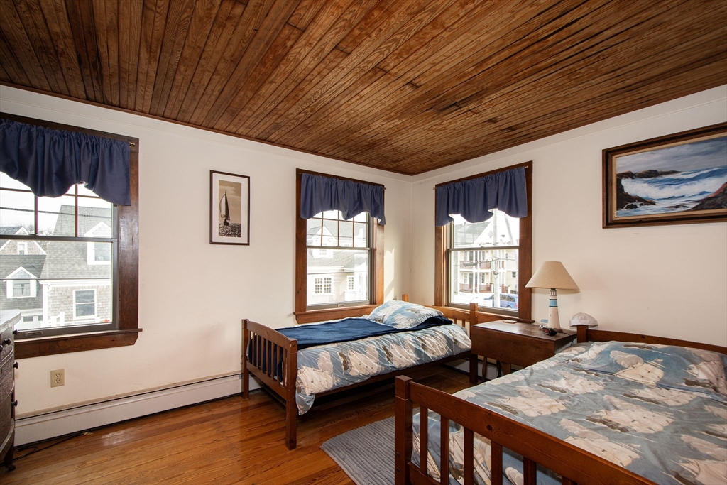 42 Lighthouse Road Scituate, MA 02066 - Photo 24 of 27 a bedroom with furniture and a window