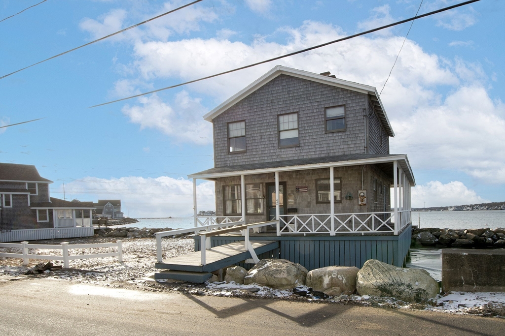 42 Lighthouse Road Scituate, MA 02066 - Photo 3 of 27 a front view of a house with entertaining space