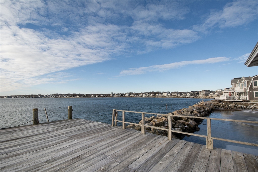 42 Lighthouse Road Scituate, MA 02066 - Photo 6 of 27 a view of a terrace with chairs