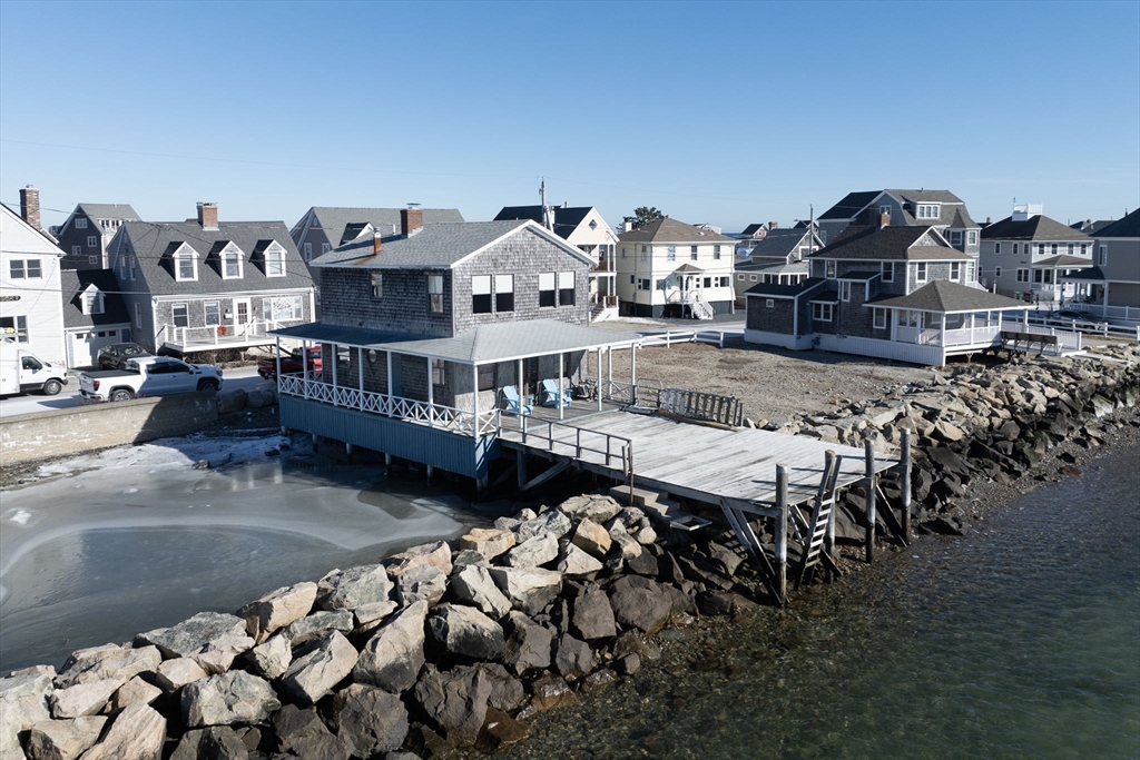 42 Lighthouse Road Scituate, MA 02066 - Photo 8 of 27 a view of balcony with outdoor seating and city view