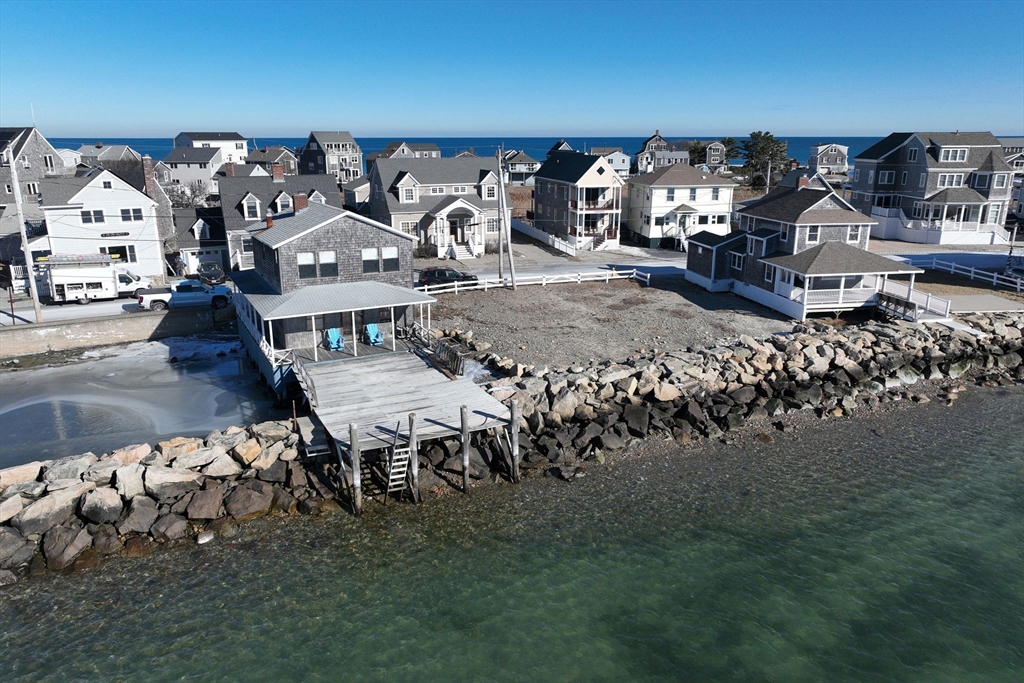42 Lighthouse Road Scituate, MA 02066 - Photo 9 of 27 a living room with lots of furniture