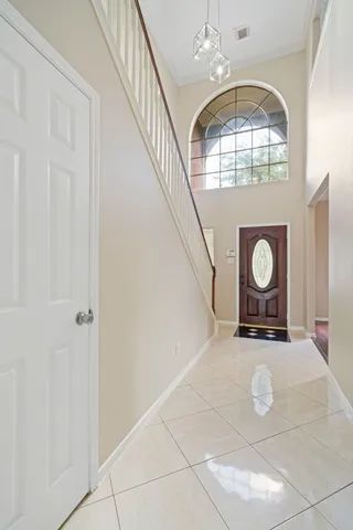 a view of an entryway with wooden floor