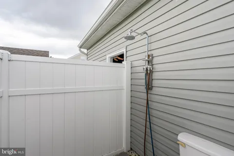 a view of a door and a window