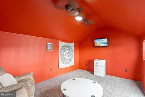 a bathroom with a sink mirror and vanity