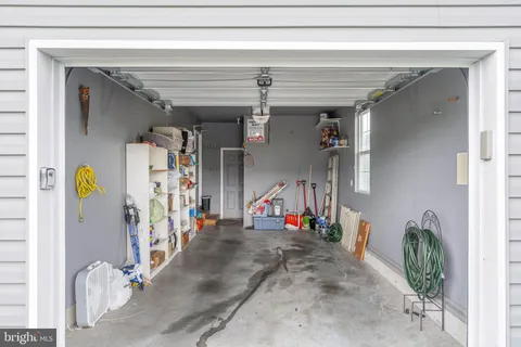 a view of car parked in front of a house