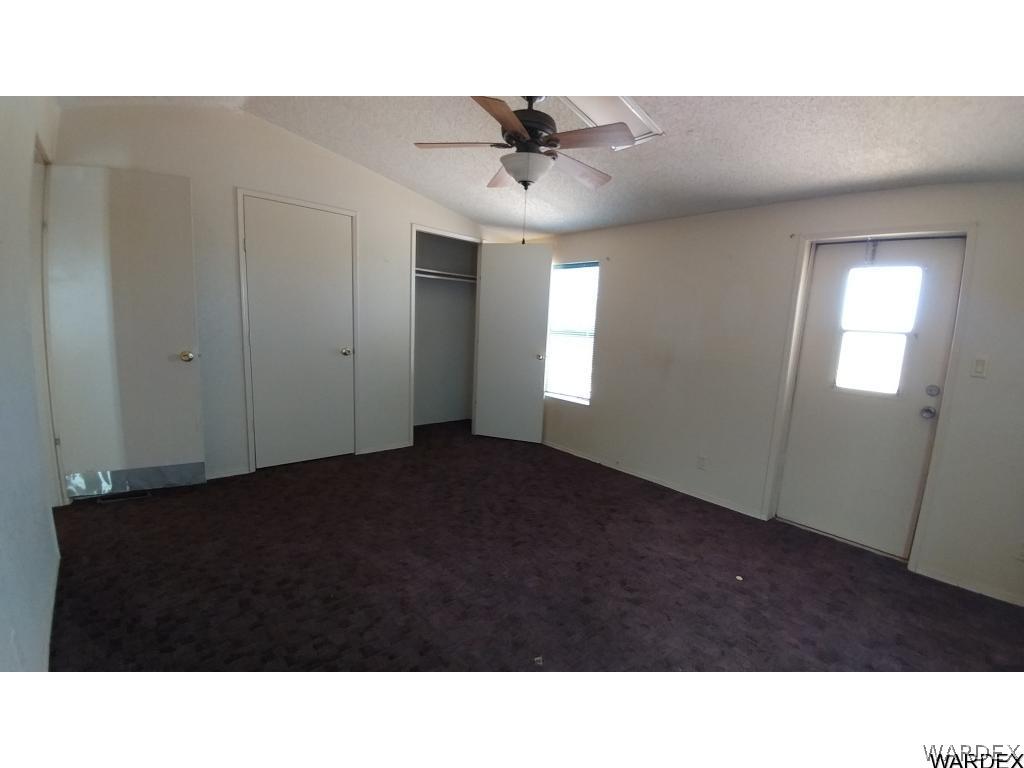 4905 Teddy Roosevelt Road Golden Valley, AZ 86413 - Photo 23 of 29 a black and white photo of a room