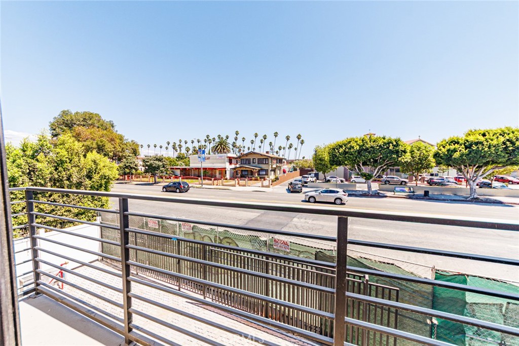 1855 Crenshaw Boulevard Los Angeles, CA 90019 - Photo 20 of 22 a view of a balcony with potted plants