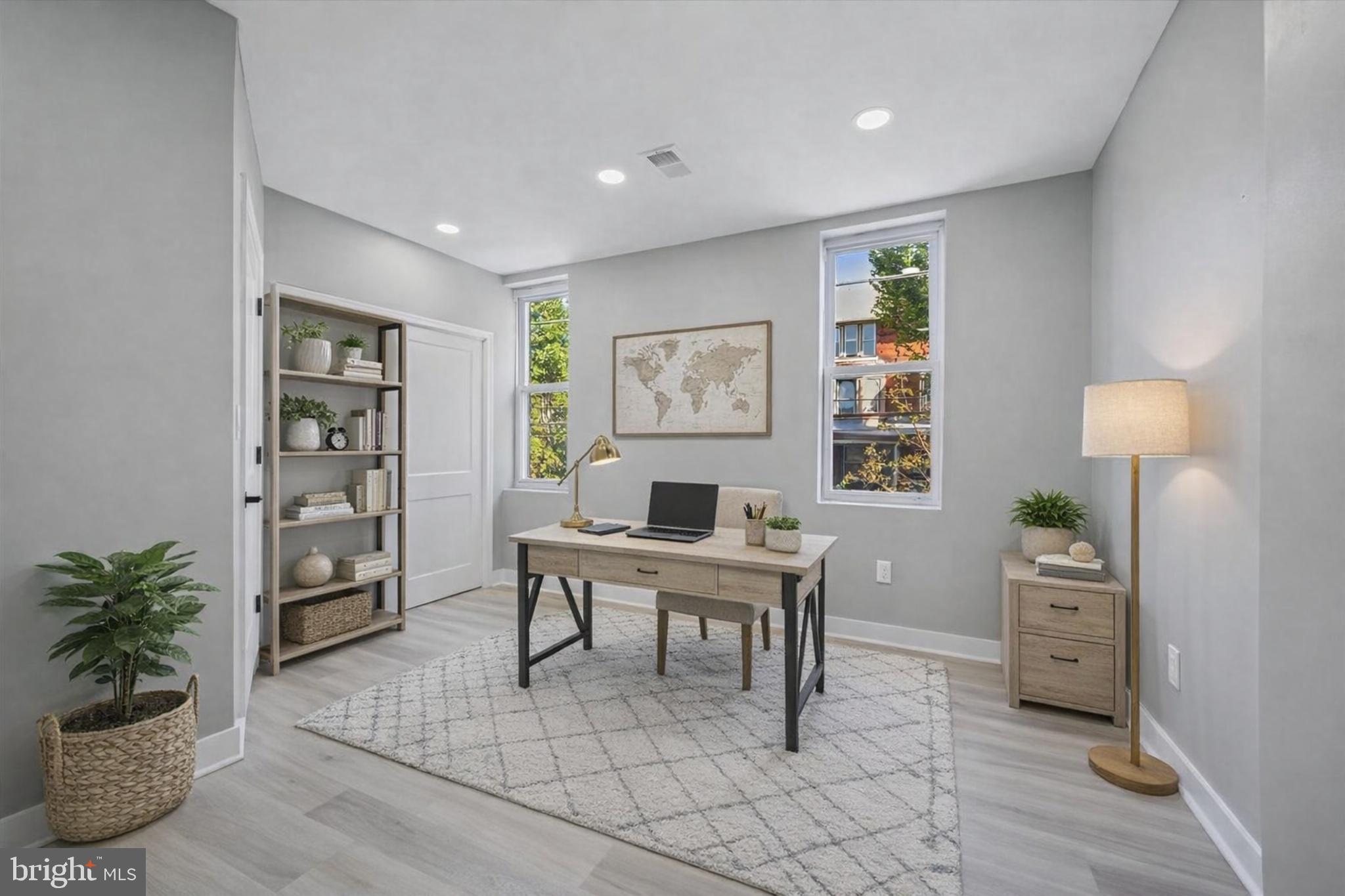 4542 Sansom Street Philadelphia, PA 19139 - Photo 17 of 36 a workspace with furniture and window