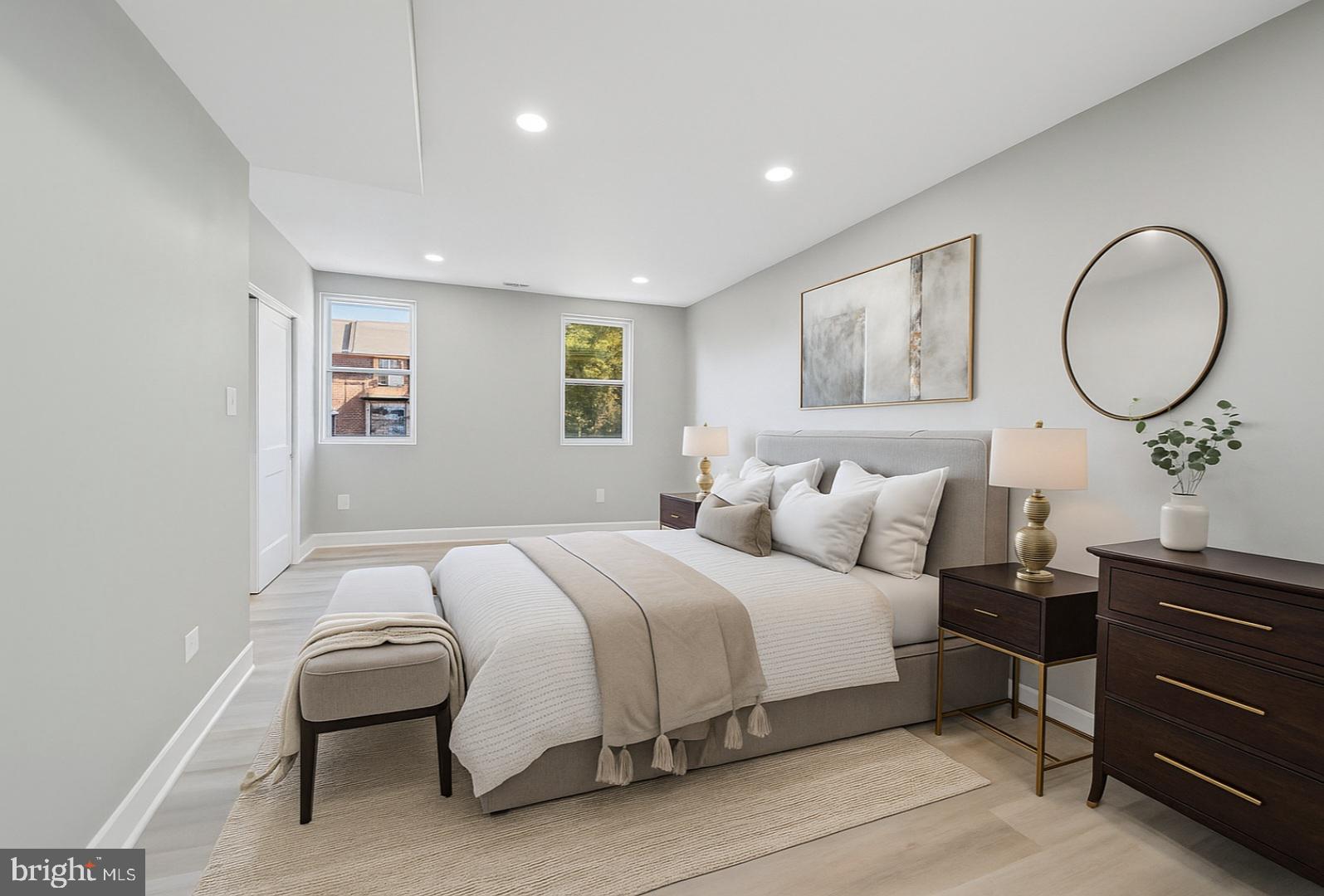 4542 Sansom Street Philadelphia, PA 19139 - Photo 20 of 36 a bedroom with a bed and a dresser