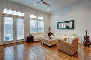 5407 Jackson Street Houston, TX 77004 - Photo 6 of 24 a bedroom with furniture and a large window