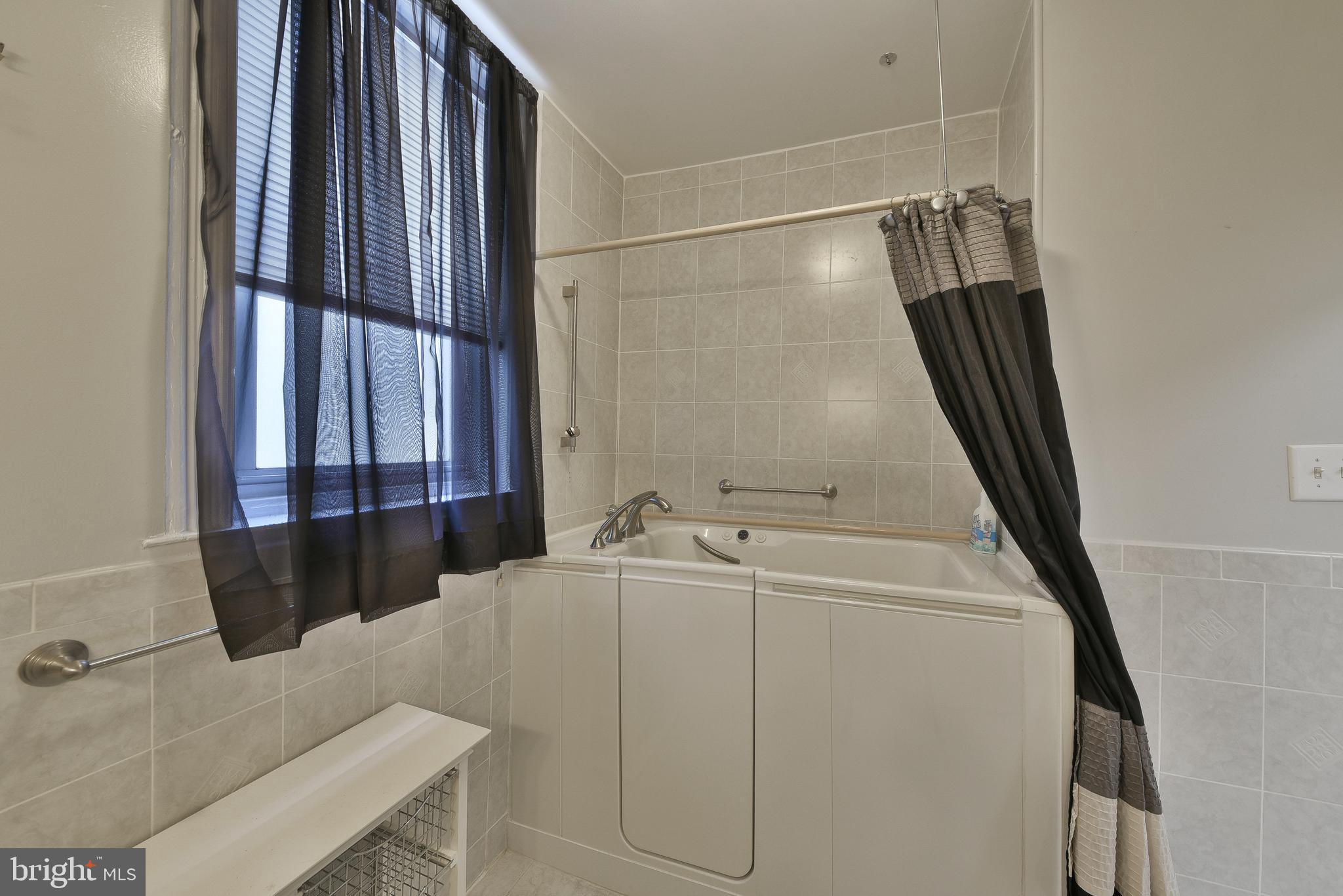 5331 Race Street Philadelphia, PA 19139 - Photo 12 of 21 a bathroom with a sink and a mirror