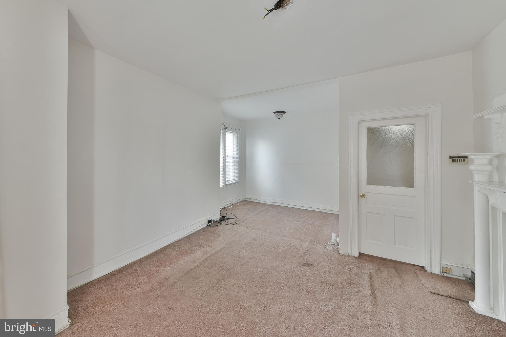 5331 Race Street Philadelphia, PA 19139 - Photo 13 of 21 a view of an empty room with a window