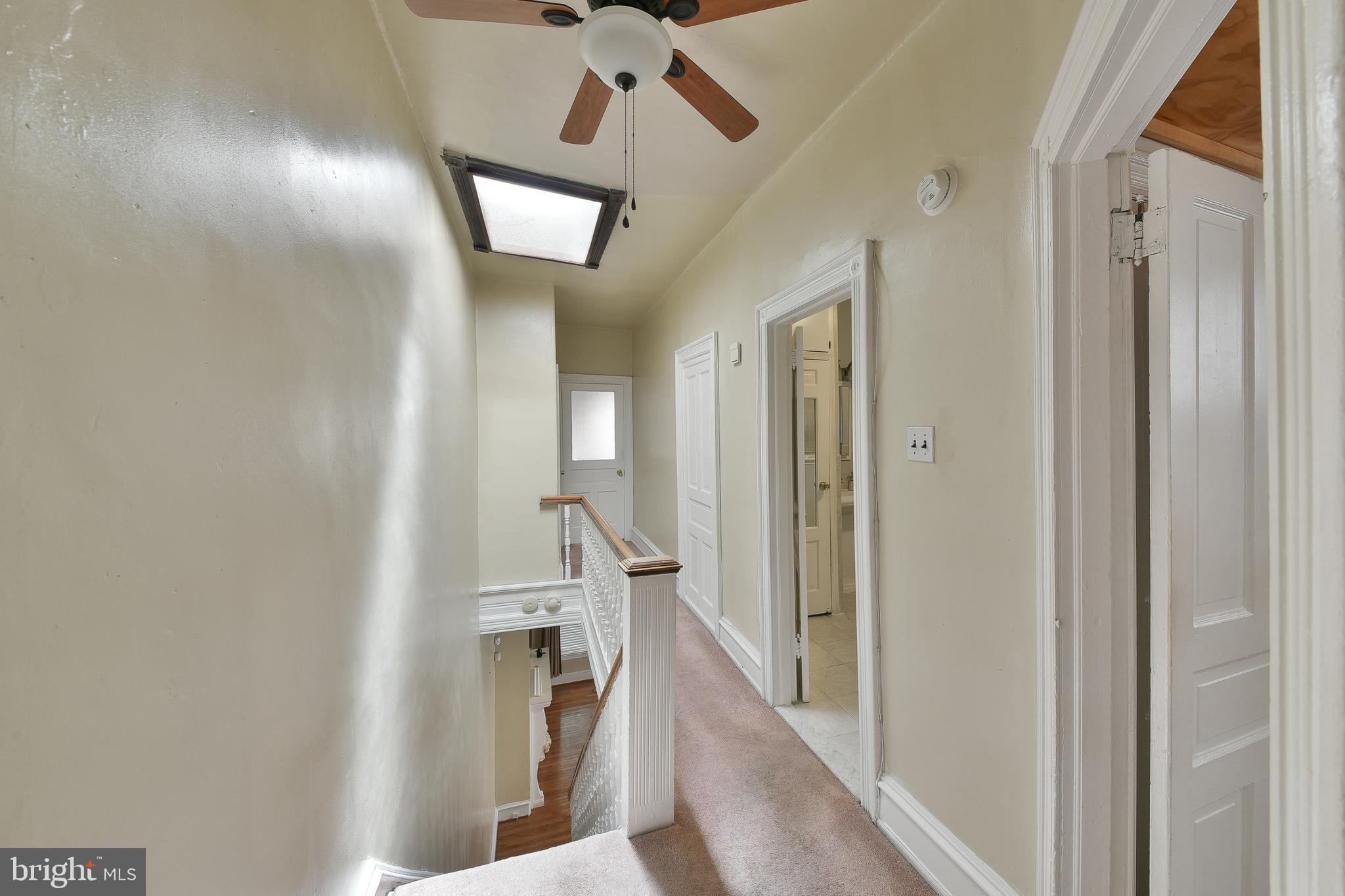 5331 Race Street Philadelphia, PA 19139 - Photo 15 of 21 a view of a hallway with a white walls and stairs