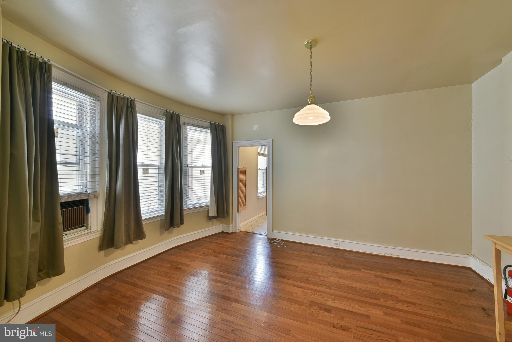 5331 Race Street Philadelphia, PA 19139 - Photo 6 of 21 a view of a room with window and wooden floor
