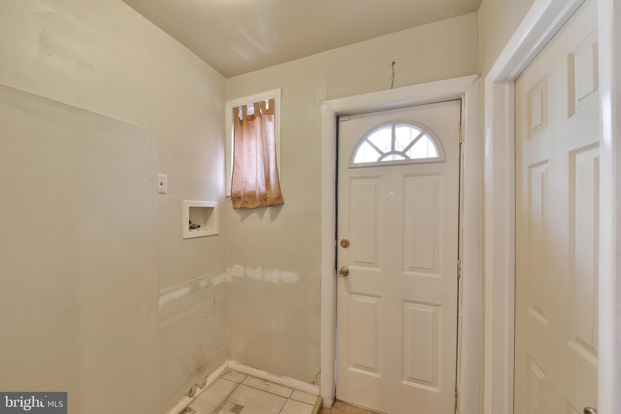5331 Race Street Philadelphia, PA 19139 - Photo 9 of 21 a bathroom with a mirror and a shower