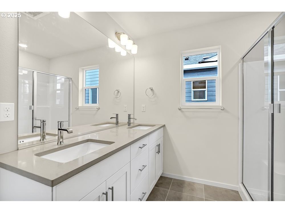 430 Southwest 32nd Street Battle Ground, WA 98604 - Photo 6 of 15 a bathroom with a sink vanity granite and a mirror
