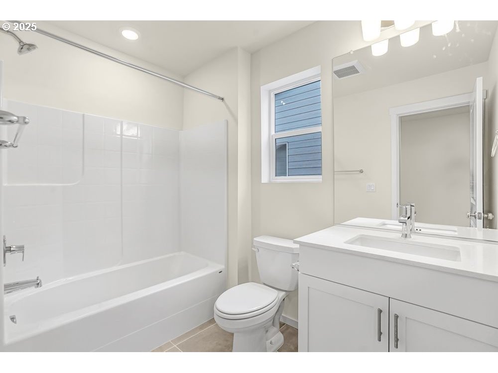 430 Southwest 32nd Street Battle Ground, WA 98604 - Photo 9 of 15 a bathroom with a sink toilet vanity and shower