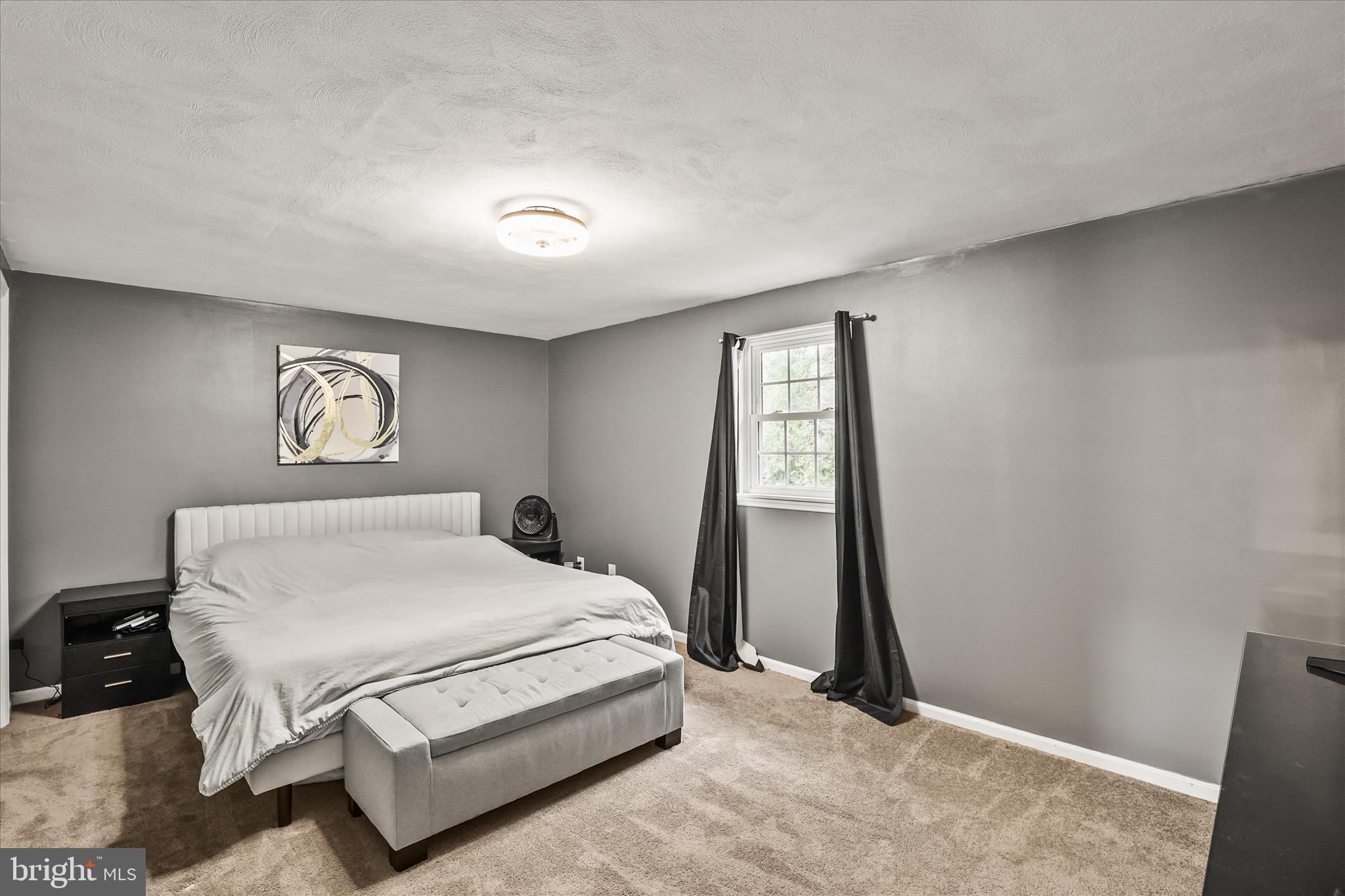 451 Weldon Drive, Unit 451 York, PA 17404 - Photo 14 of 38 a bedroom with a bed and a window