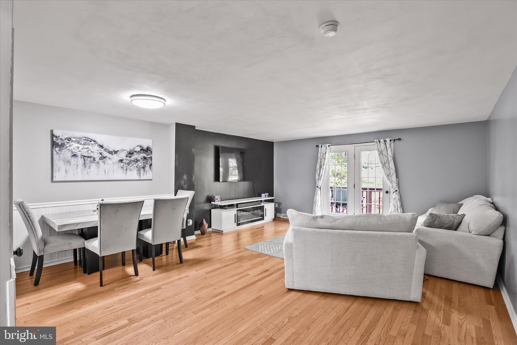 451 Weldon Drive, Unit 451 York, PA 17404 - Photo 3 of 38 a living room with furniture and wooden floor