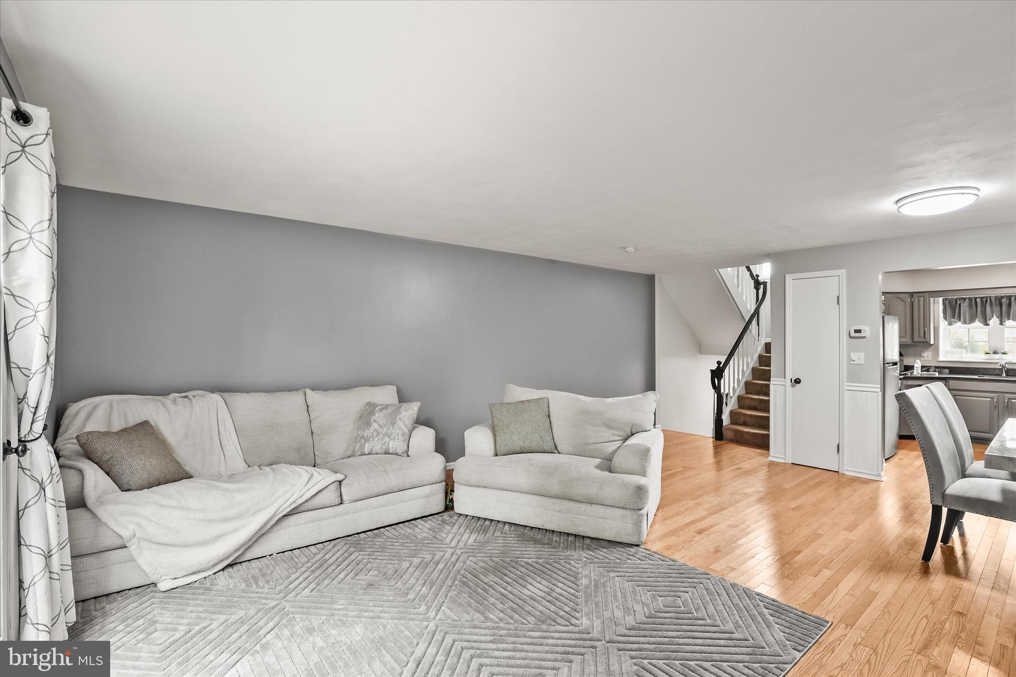 451 Weldon Drive, Unit 451 York, PA 17404 - Photo 7 of 38 a living room with furniture and wooden floor
