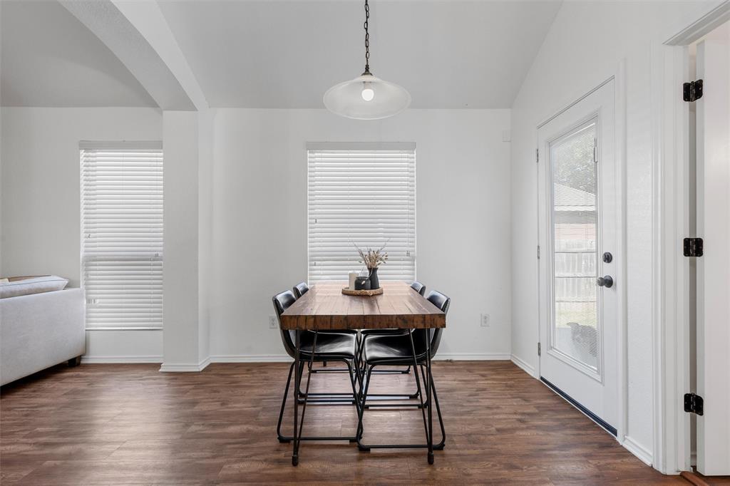 4321 South Fork Ranch Road Waco, TX 76705 - Photo 11 of 17 a view of a dining room with furniture window and wooden floor