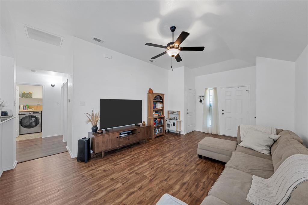 4321 South Fork Ranch Road Waco, TX 76705 - Photo 10 of 17 a living room with furniture and a flat screen tv