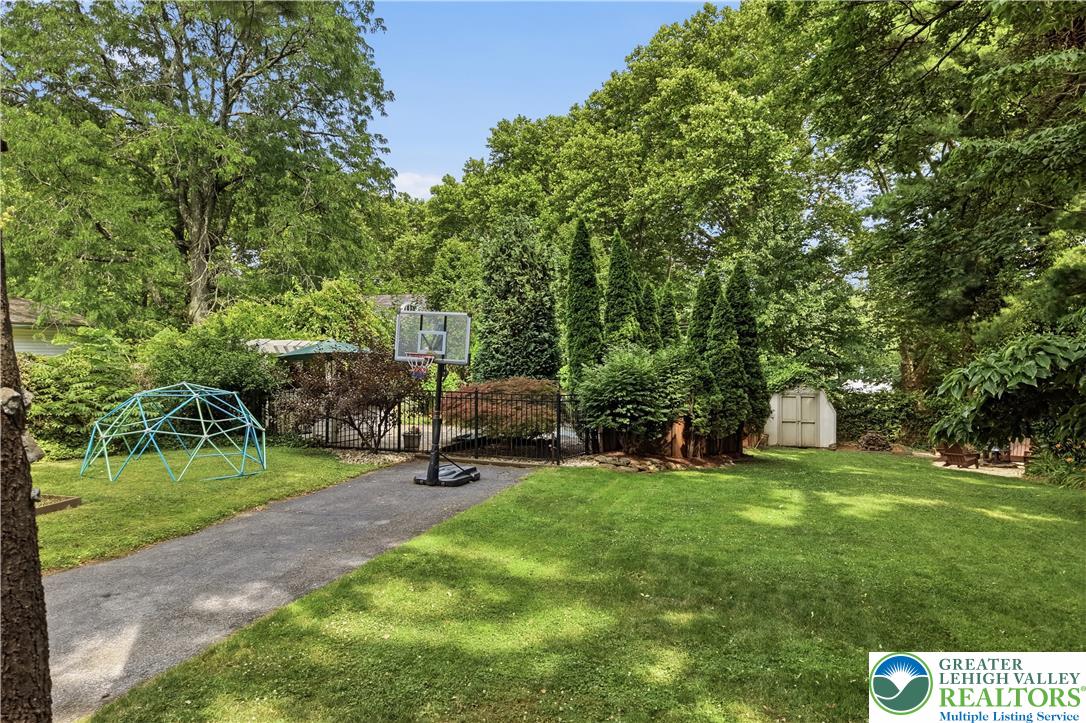 2014 Linden Street Bethlehem, PA 18017 - Photo 62 of 85 A verdant backyard retreat offers ample space for recreation and outdoor enjoyment.