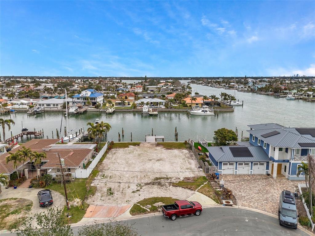 an aerial view of a house with outdoor space