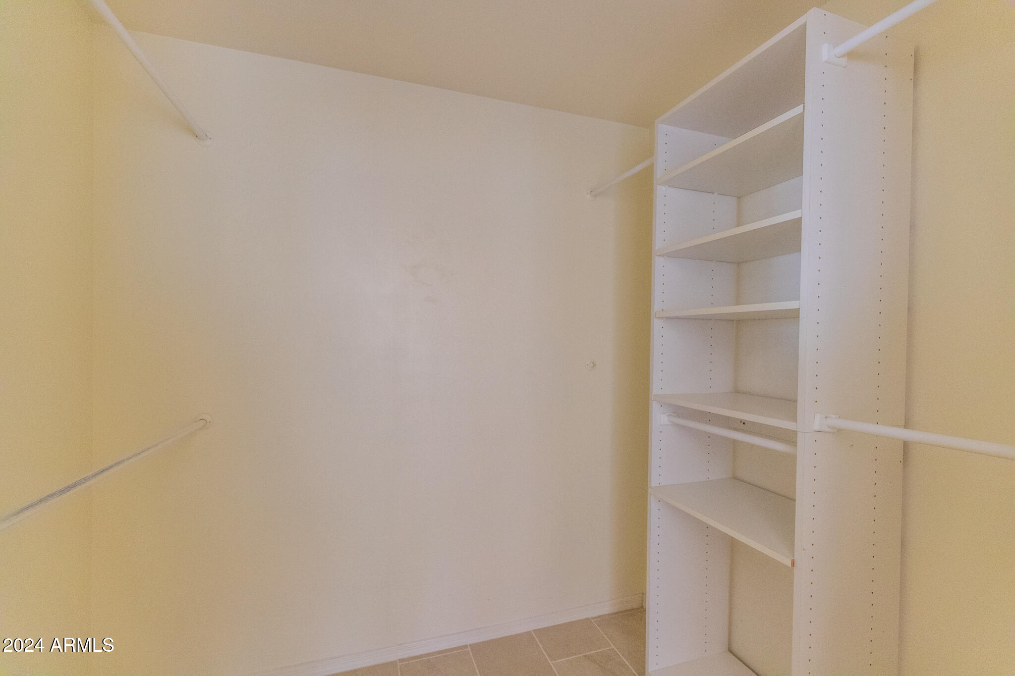 9013 North 14th Street Phoenix, AZ 85020 - Photo 14 of 24 a view of an empty walk in closet