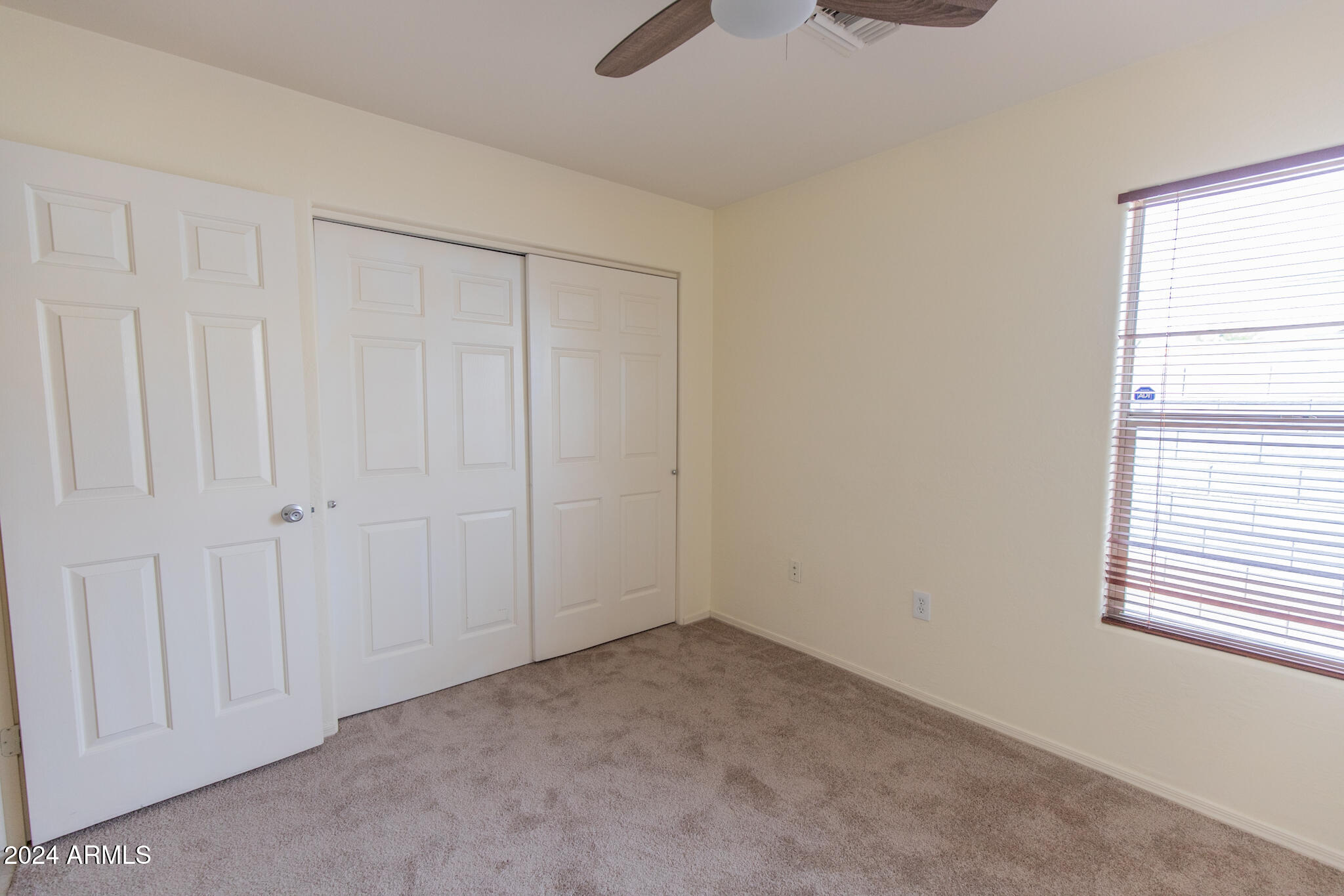 9013 North 14th Street Phoenix, AZ 85020 - Photo 16 of 24 a view of an empty room with a window
